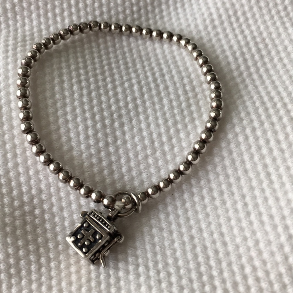 Children’s bracelet with prayer box charm
